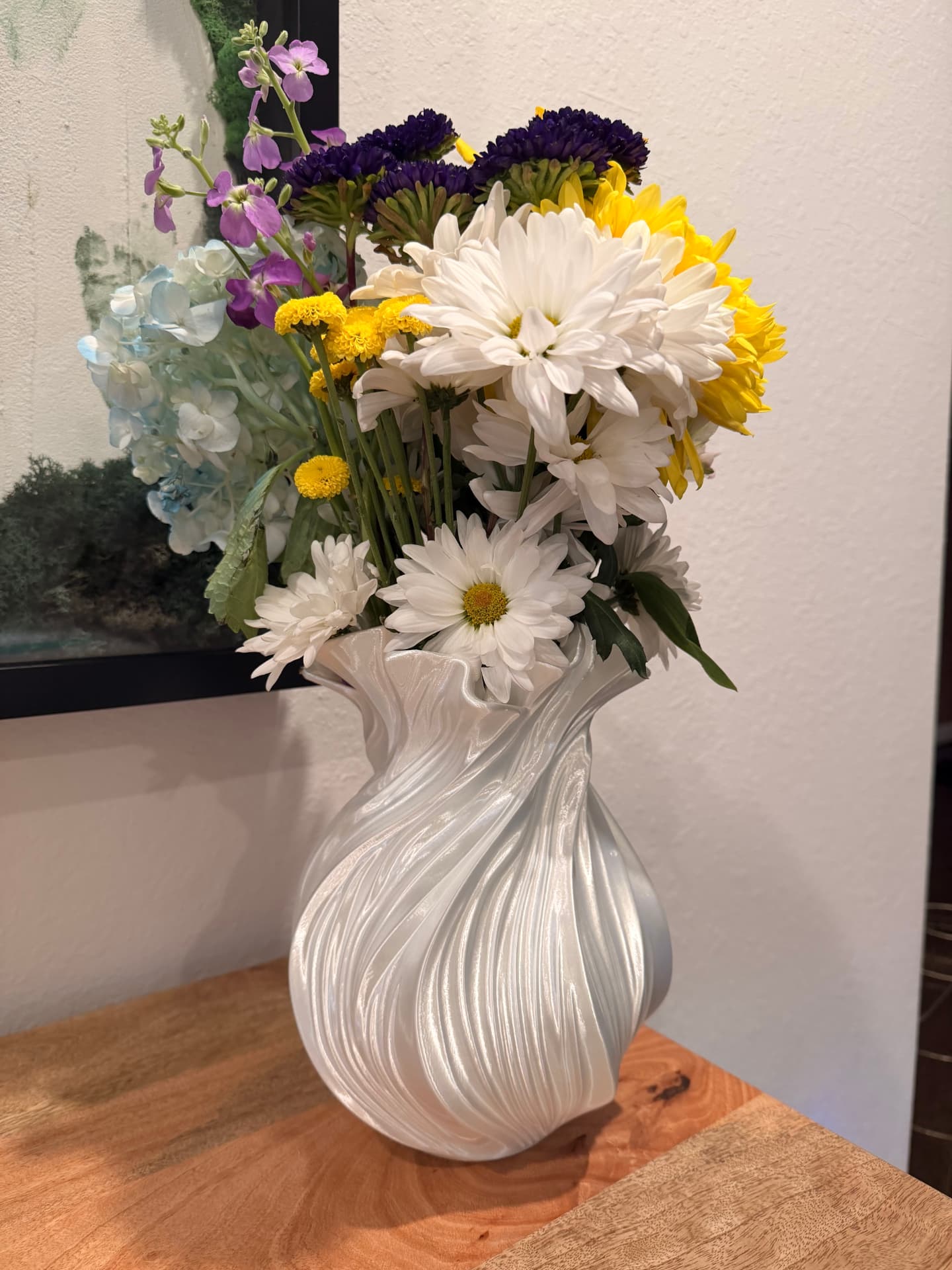 White Wave Vase 3D printed vase decorating a table in a kids room corner