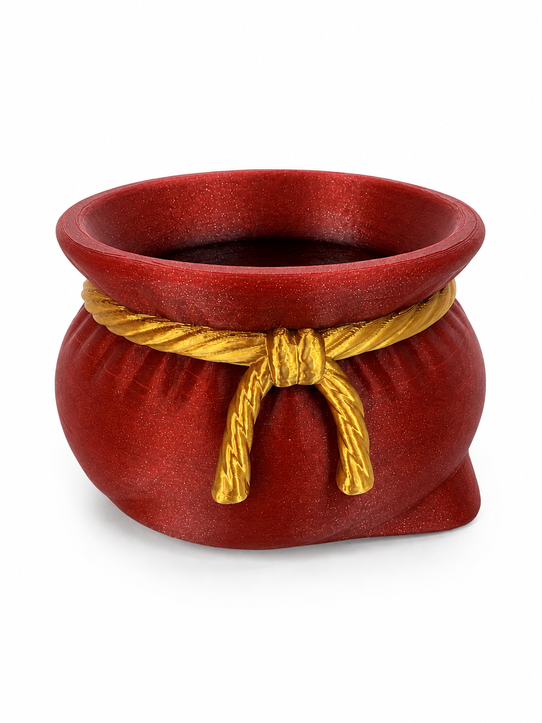 Studio shot of the red Santa's Sack Bowl, a 3D printed gathered bowl with ribbon-tied detail on a white background